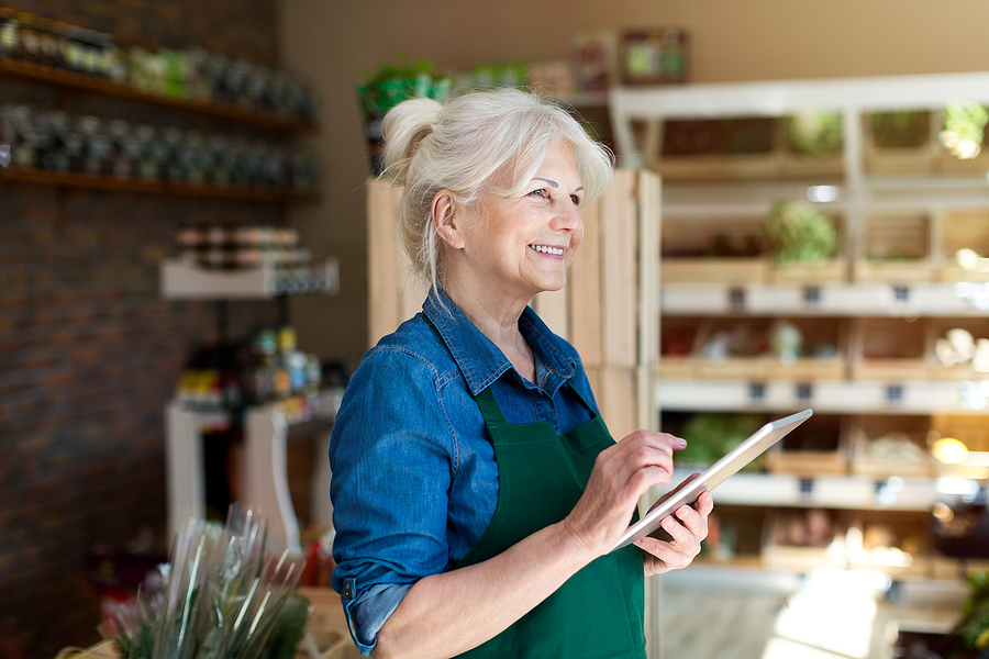 Bigstock Shop Assistant With Digital Ta